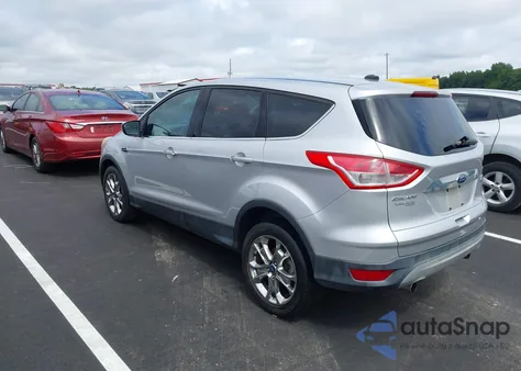 2013 Ford Escape Sel z USA, uszkodzony, nr VIN 1FMCU0HXXDUB51540